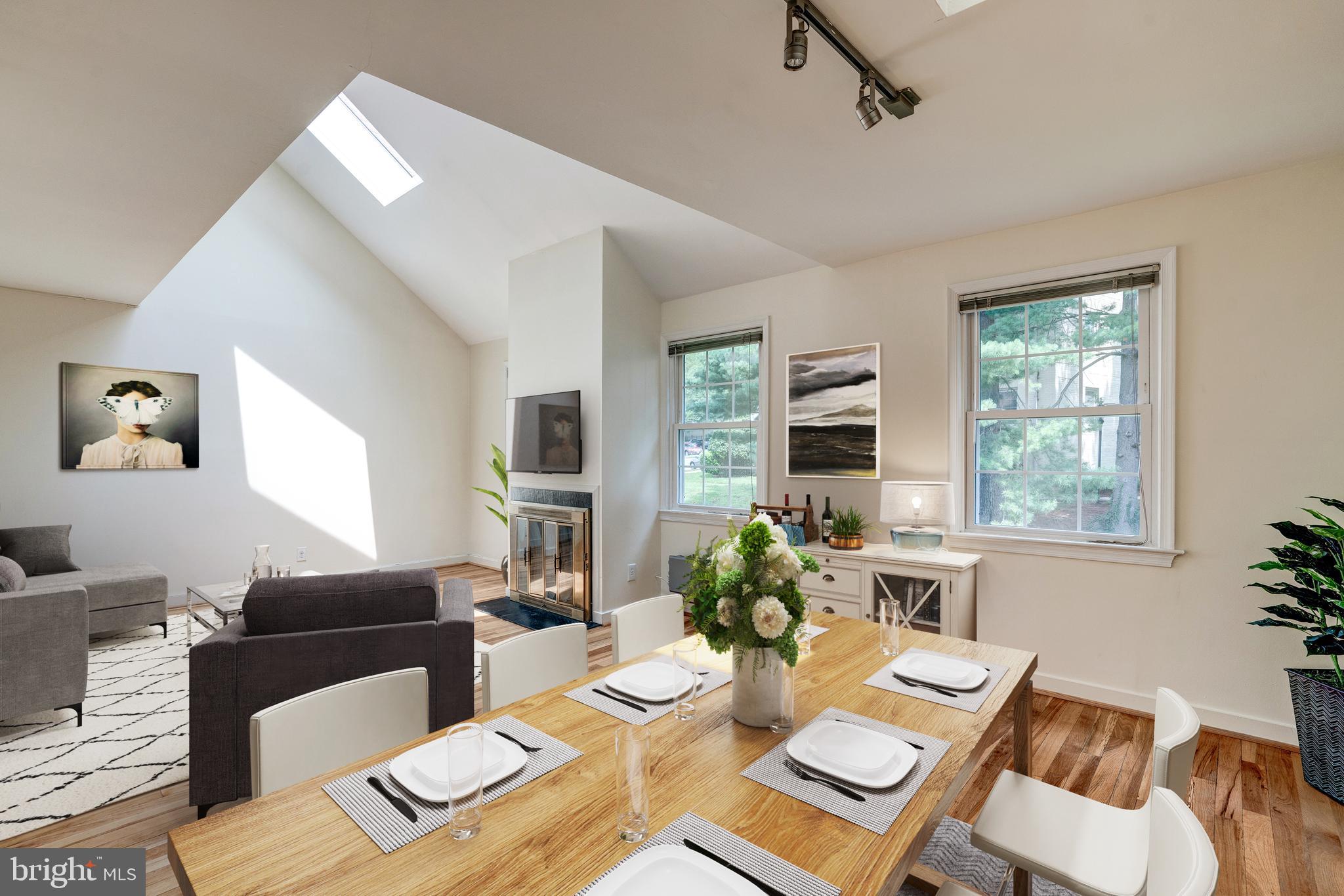 8205 Grubb Road, Unit G202 Silver Spring, MD 20910 - Photo 8 of 38 DINING AREA & DRAMATIC LR W/ SOURING CATH. CEILING