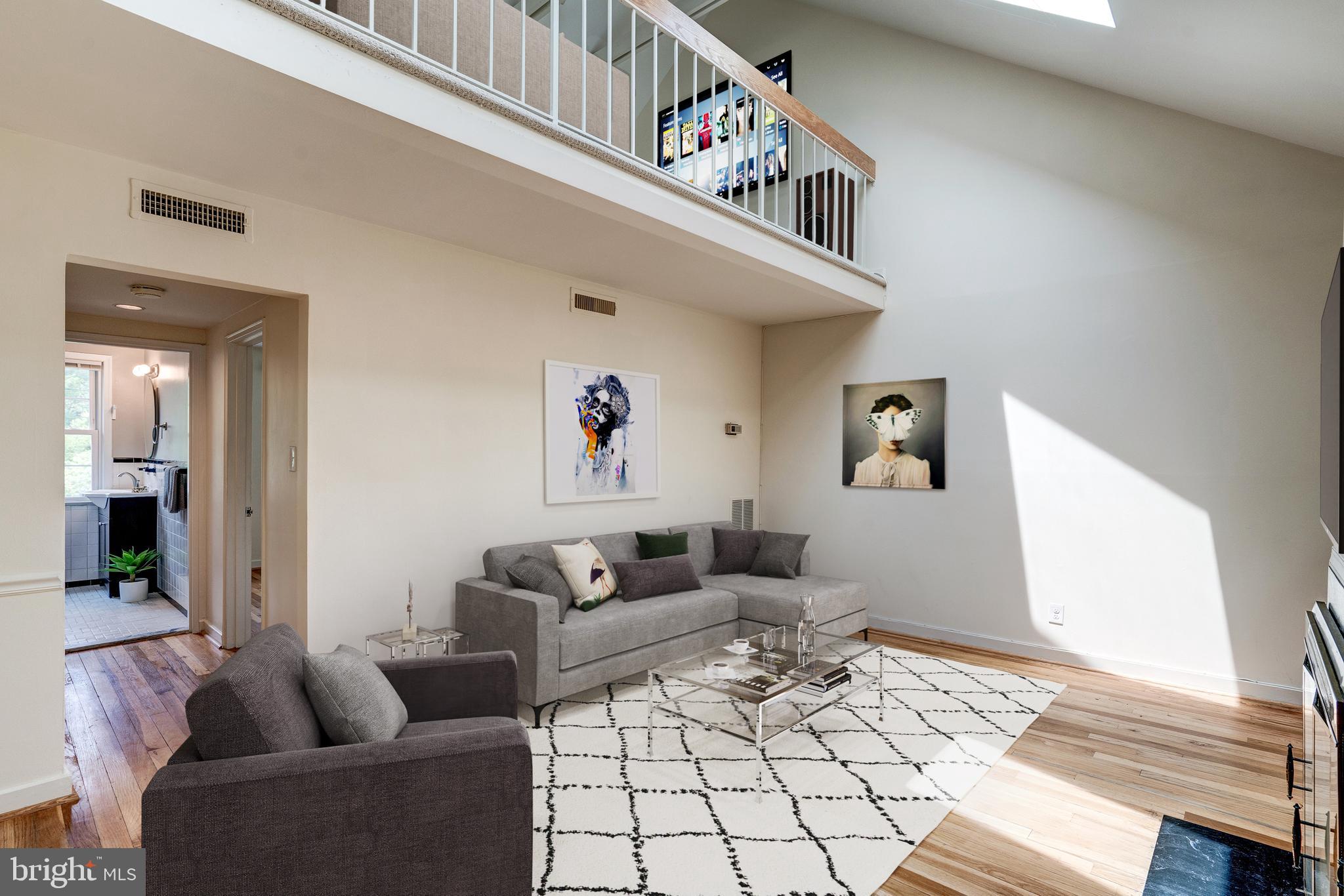 8205 Grubb Road, Unit G202 Silver Spring, MD 20910 - Photo 9 of 38 LIV. RM W/SKYLIT CATHEDRAL CEILING. SOUTHERN LIGHT