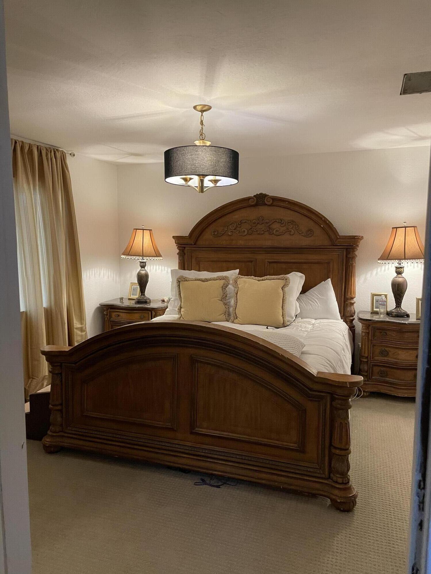 14818 Desert Star Road Apple Valley, CA 92307 - Photo 2 of 10 a bedroom with a bed and window