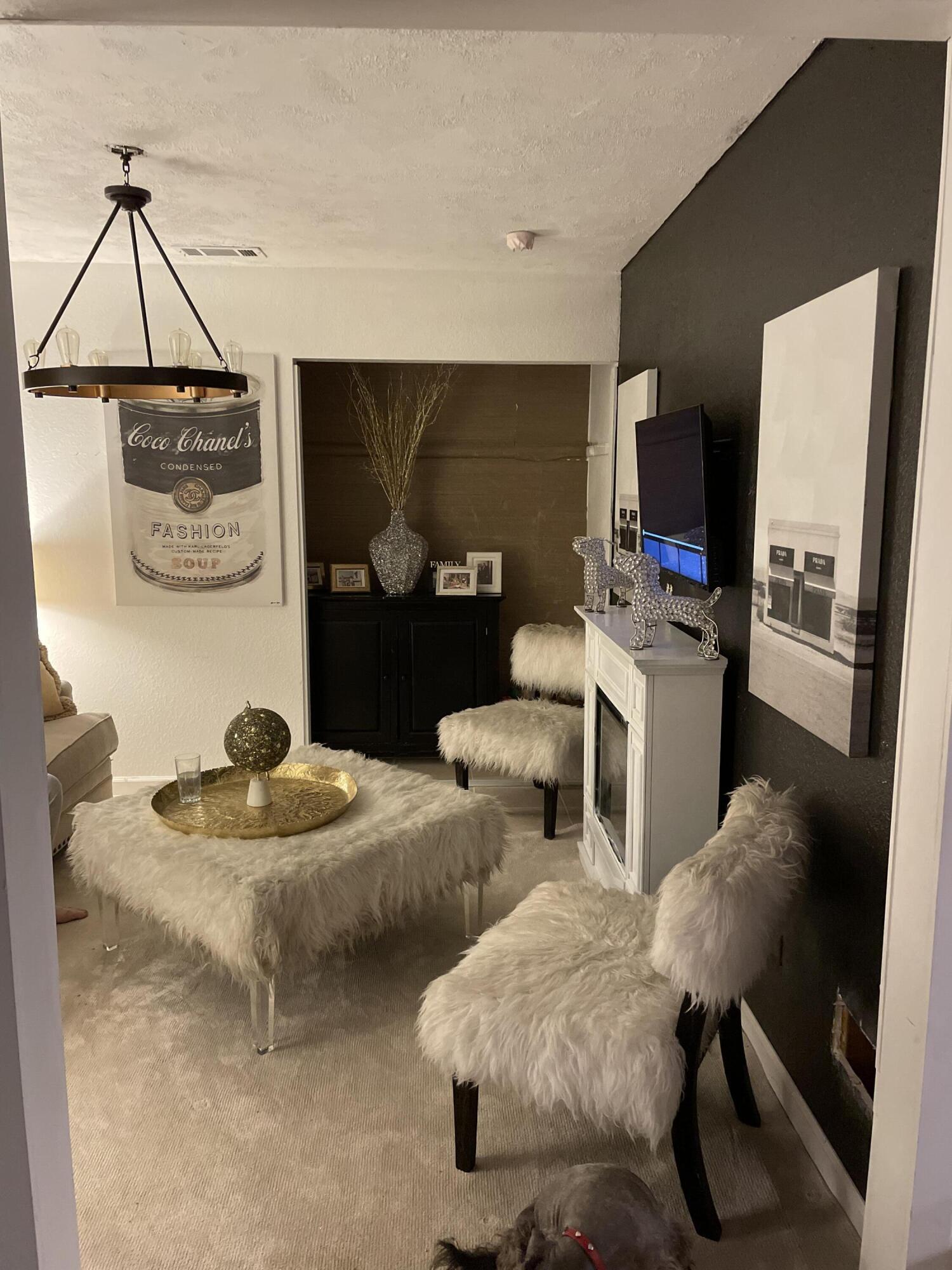 14818 Desert Star Road Apple Valley, CA 92307 - Photo 5 of 10 a living room with furniture and a flat screen tv