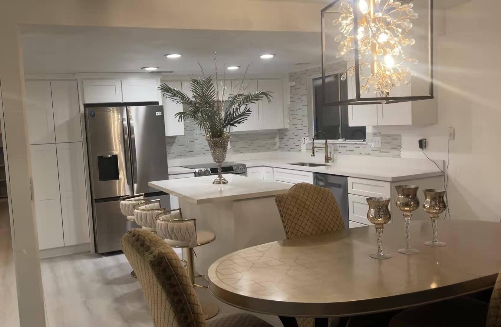 14818 Desert Star Road Apple Valley, CA 92307 - Photo 9 of 10 a kitchen with a sink appliances and a dining table