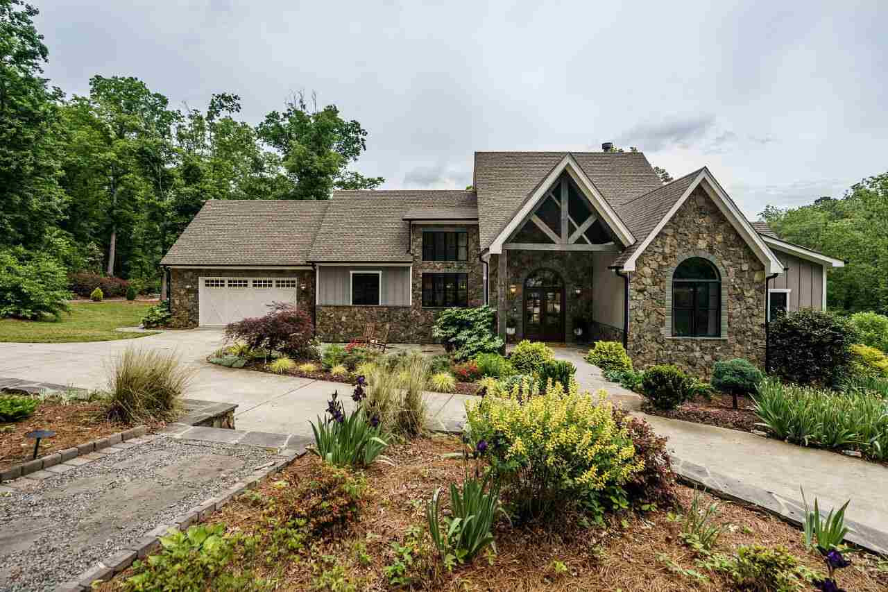 4709 Bountiful Lane Apex, NC 27539 - Photo 1 of 30 a front view of a house with garden