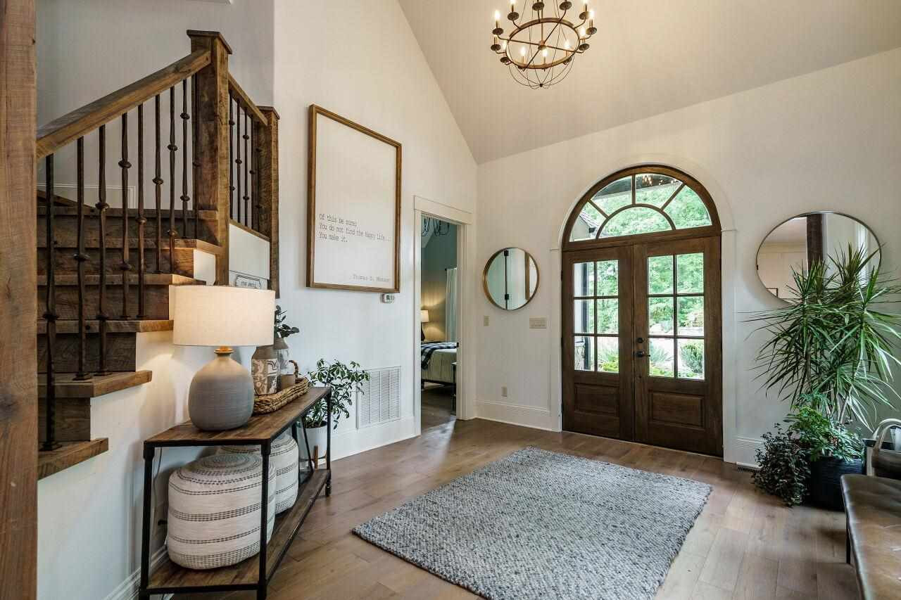 4709 Bountiful Lane Apex, NC 27539 - Photo 2 of 30 a view of hall way with furniture and windows