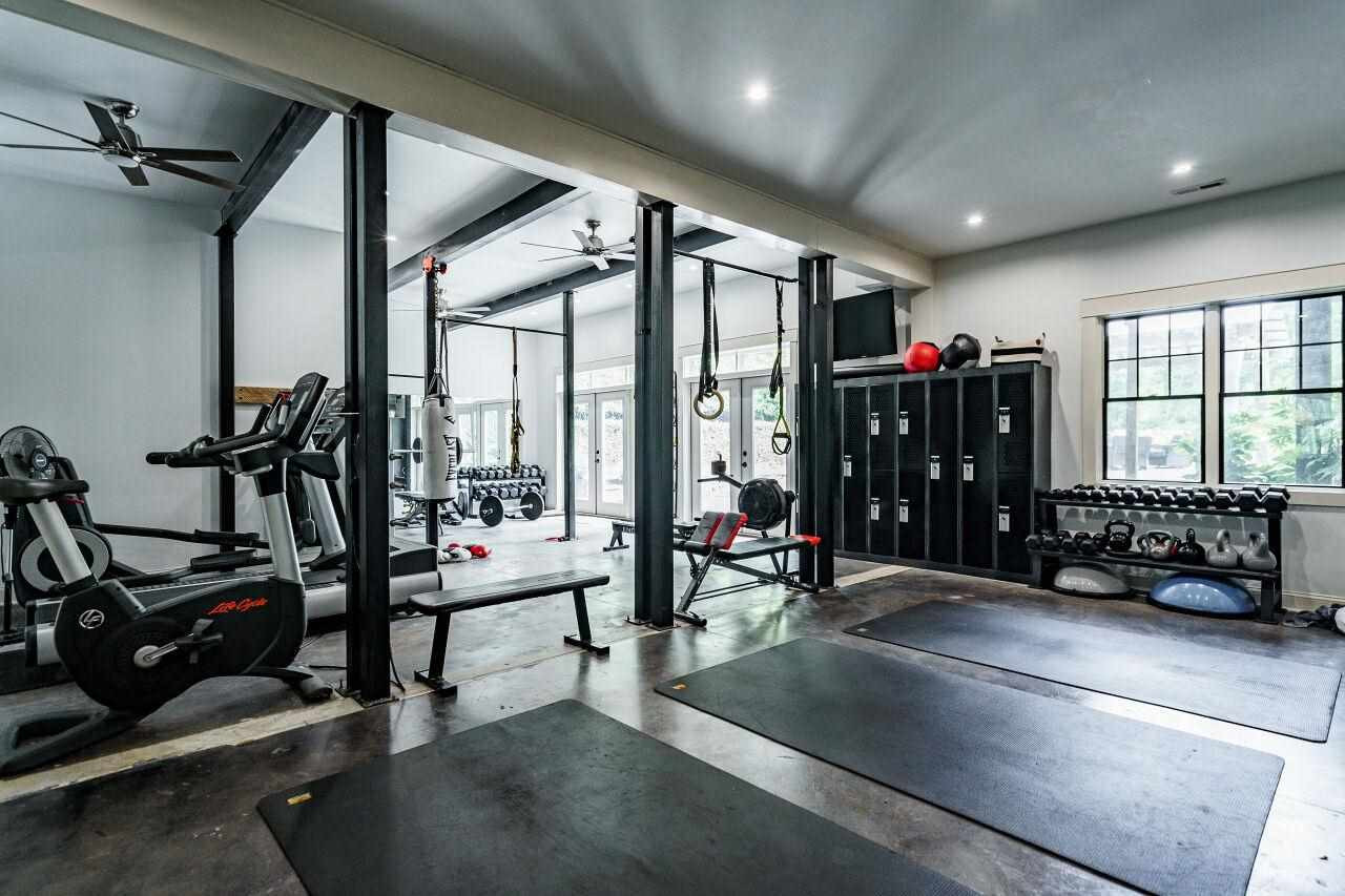 4709 Bountiful Lane Apex, NC 27539 - Photo 24 of 30 a view of a room with gym equipment