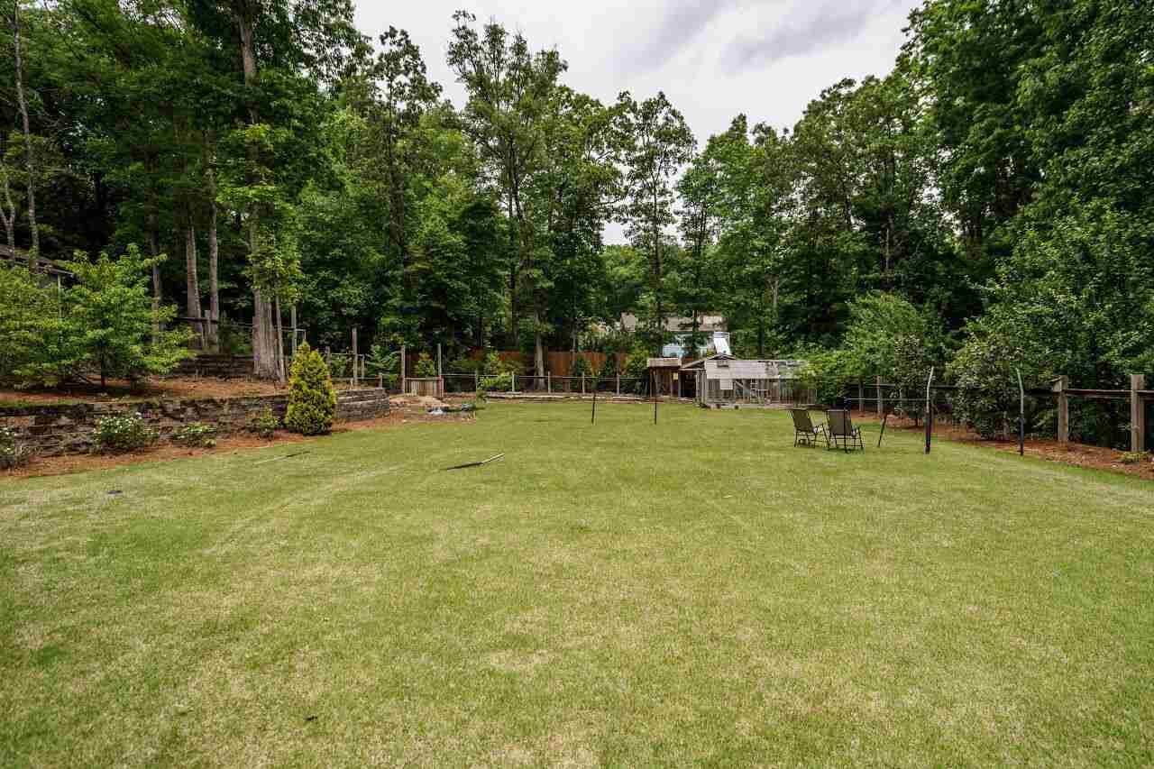 4709 Bountiful Lane Apex, NC 27539 - Photo 30 of 30 a view of outdoor space with garden and trees
