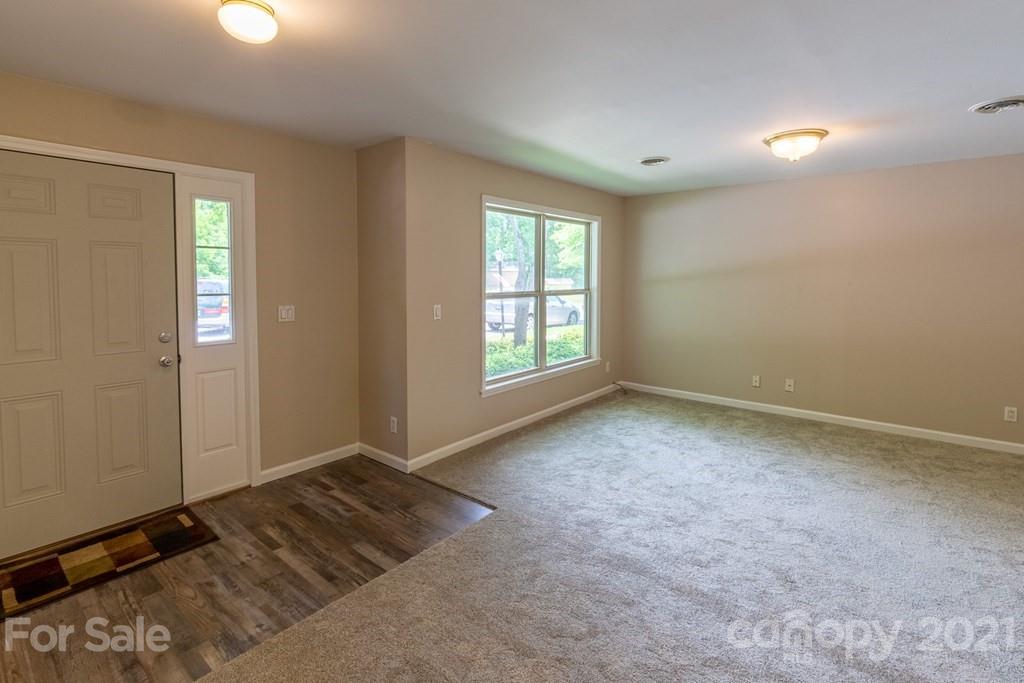 171 North Ridge Point, Unit V3 Sylva, NC 28779 - Photo 3 of 29 an empty room with windows