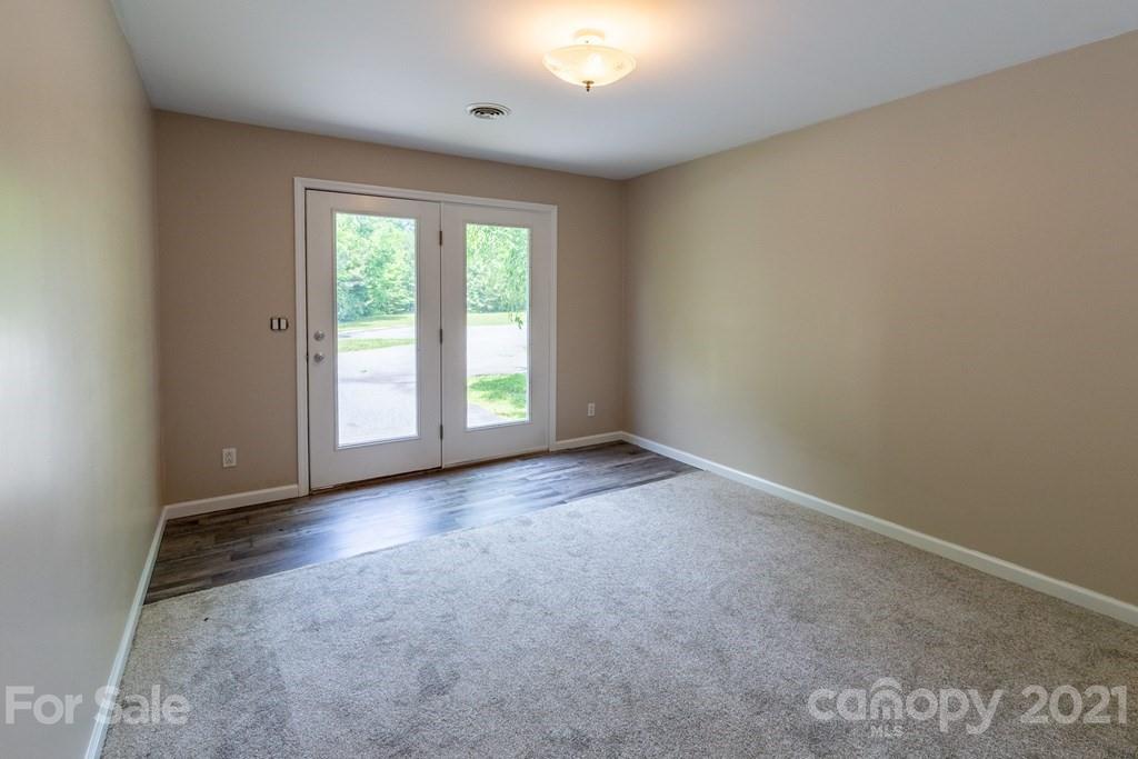 171 North Ridge Point, Unit V3 Sylva, NC 28779 - Photo 10 of 29 an empty room with windows