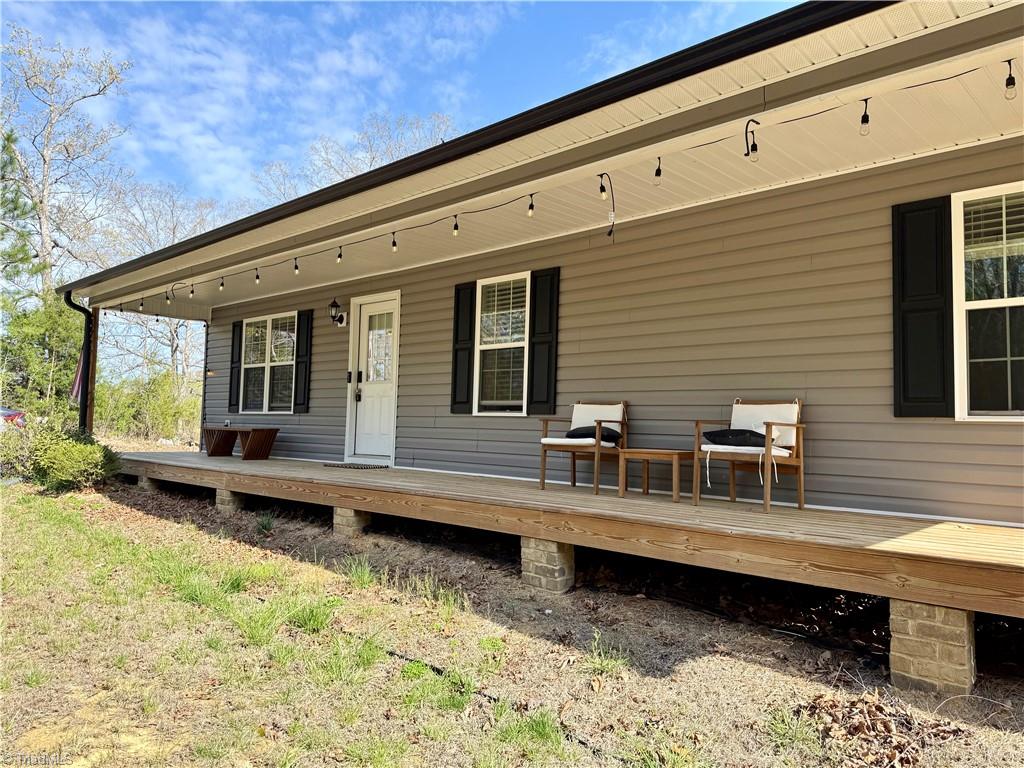 5280 Tabernacle School Road Asheboro, NC 27205 - Photo 11 of 22 Long Front Porch