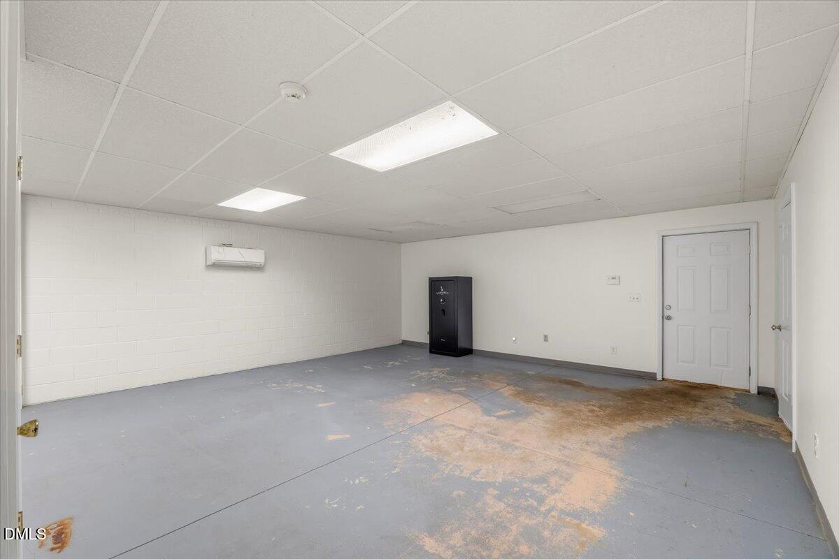 685 River Run Road Selma, NC 27576 - Photo 20 of 27 an empty room with a empty space and windows