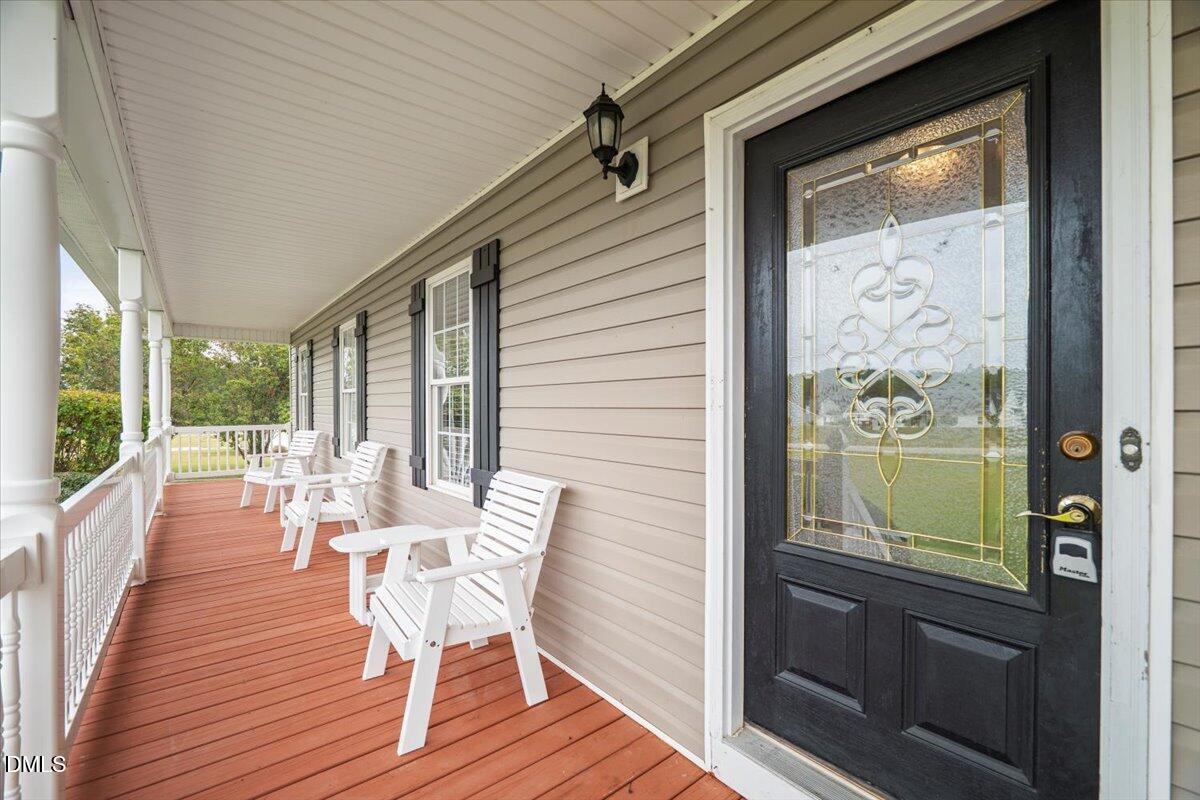 685 River Run Road Selma, NC 27576 - Photo 2 of 27 a view of a two chairs in the balcony