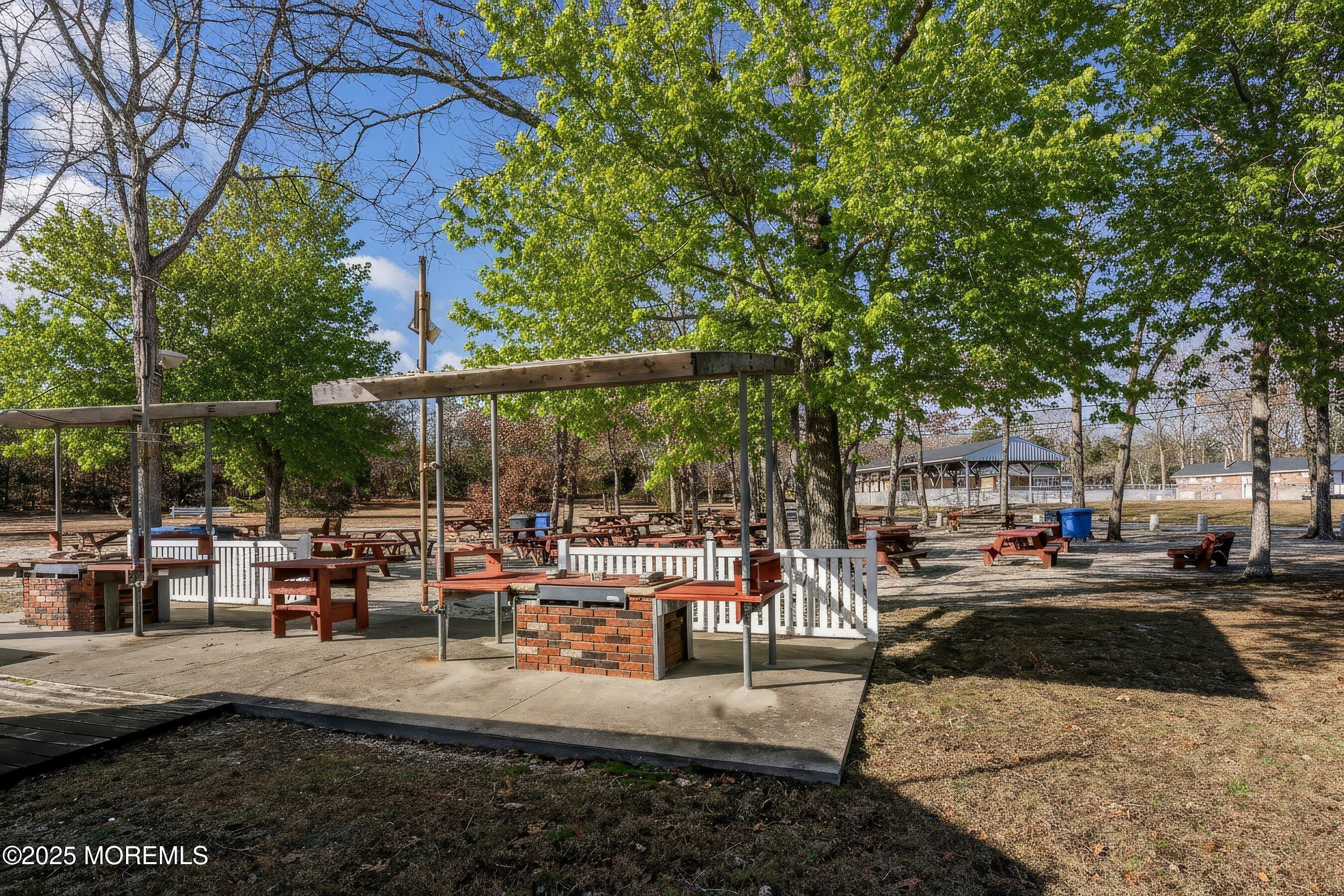 10 Magnolia Road, Unit 19 Manahawkin, NJ 08050 - Photo 28 of 30 a view of outdoor space with seating area