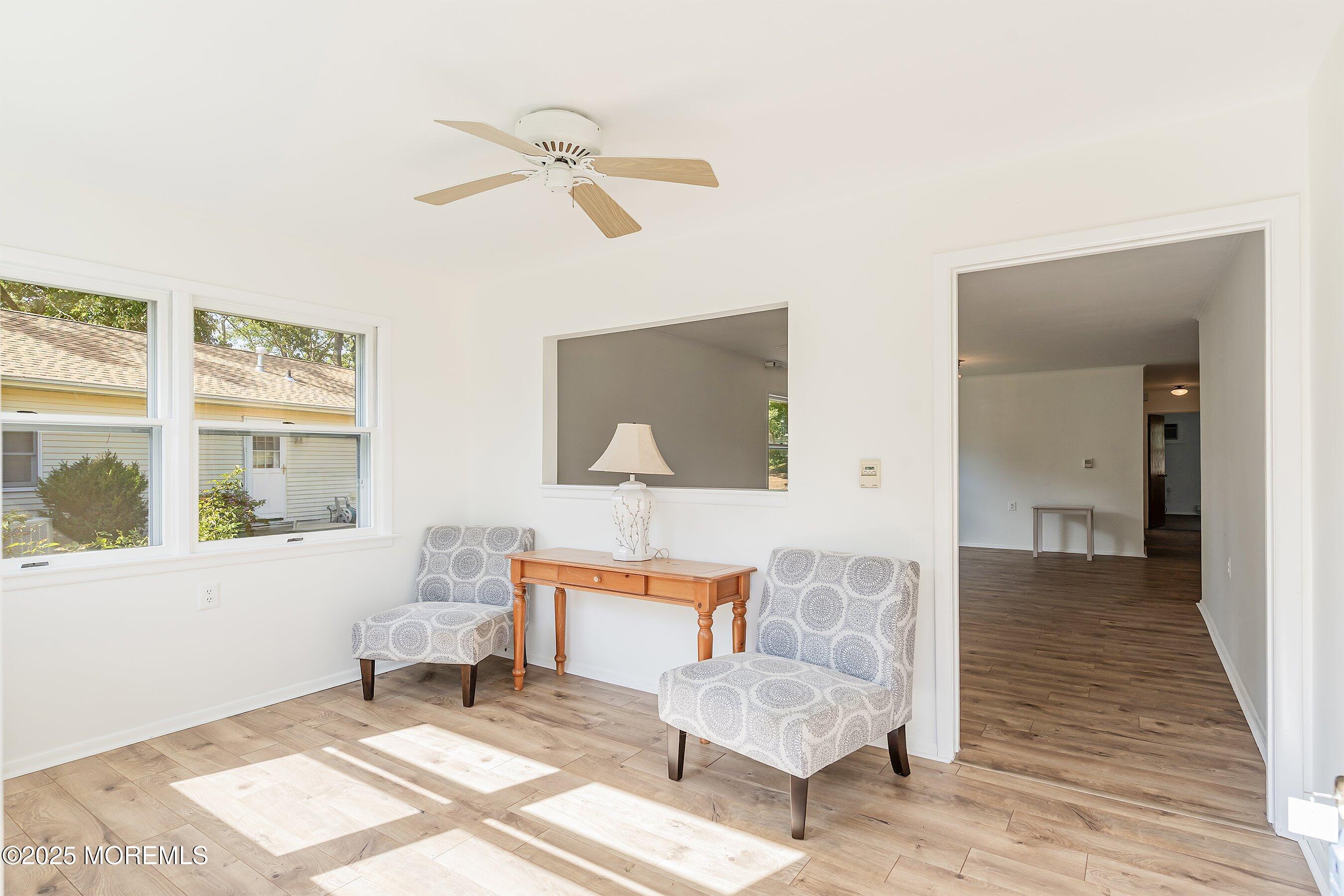 10 Magnolia Road, Unit 19 Manahawkin, NJ 08050 - Photo 5 of 30 a living room with furniture and a window