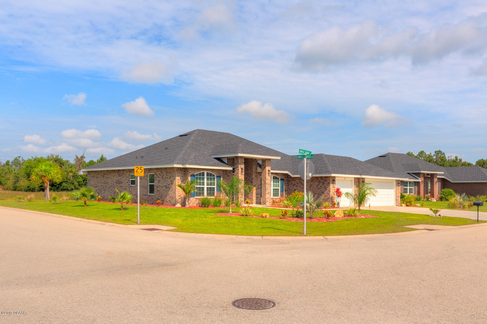 30 Turtle Ridge Drive Flagler Beach, FL 32136 - Photo 31 of 34 a view of a house with a big yard and large trees