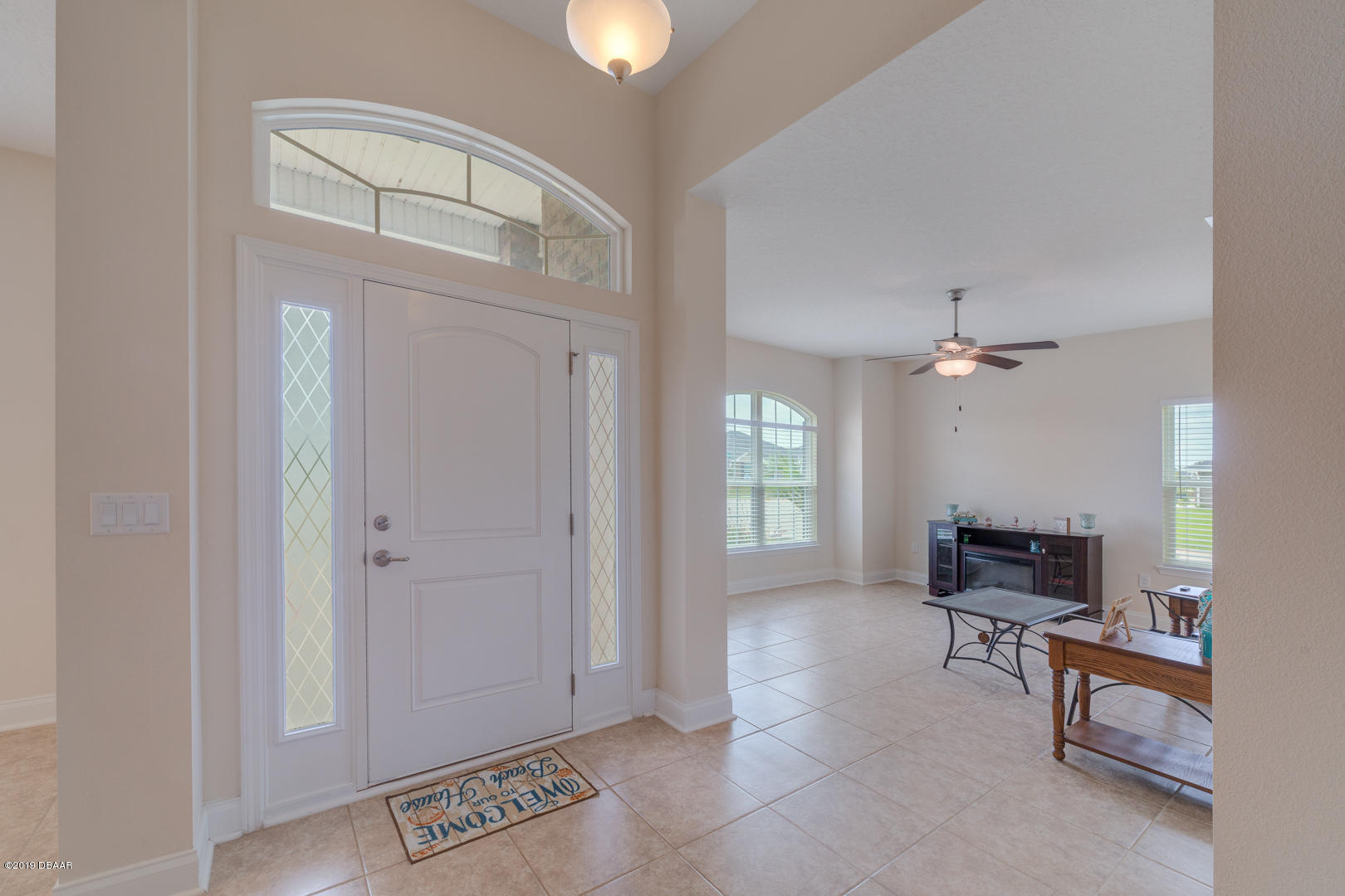 30 Turtle Ridge Drive Flagler Beach, FL 32136 - Photo 4 of 34 a view of a livingroom with furniture and a window