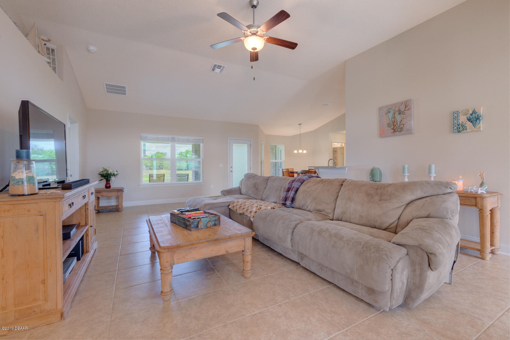 30 Turtle Ridge Drive Flagler Beach, FL 32136 - Photo 8 of 34 a living room with furniture and a window