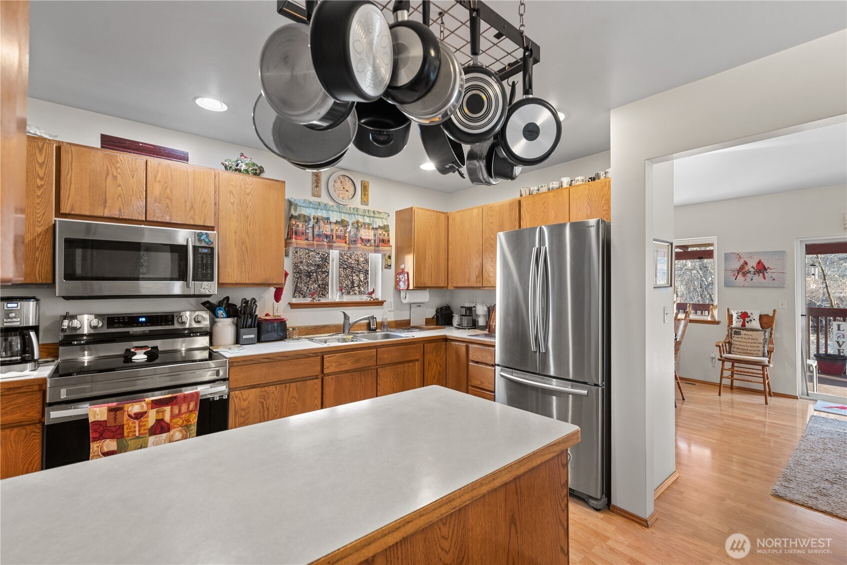 3152 Bermuda Street Malaga, WA 98828 - Photo 15 of 37 a kitchen with stainless steel appliances granite countertop a refrigerator and a stove top oven