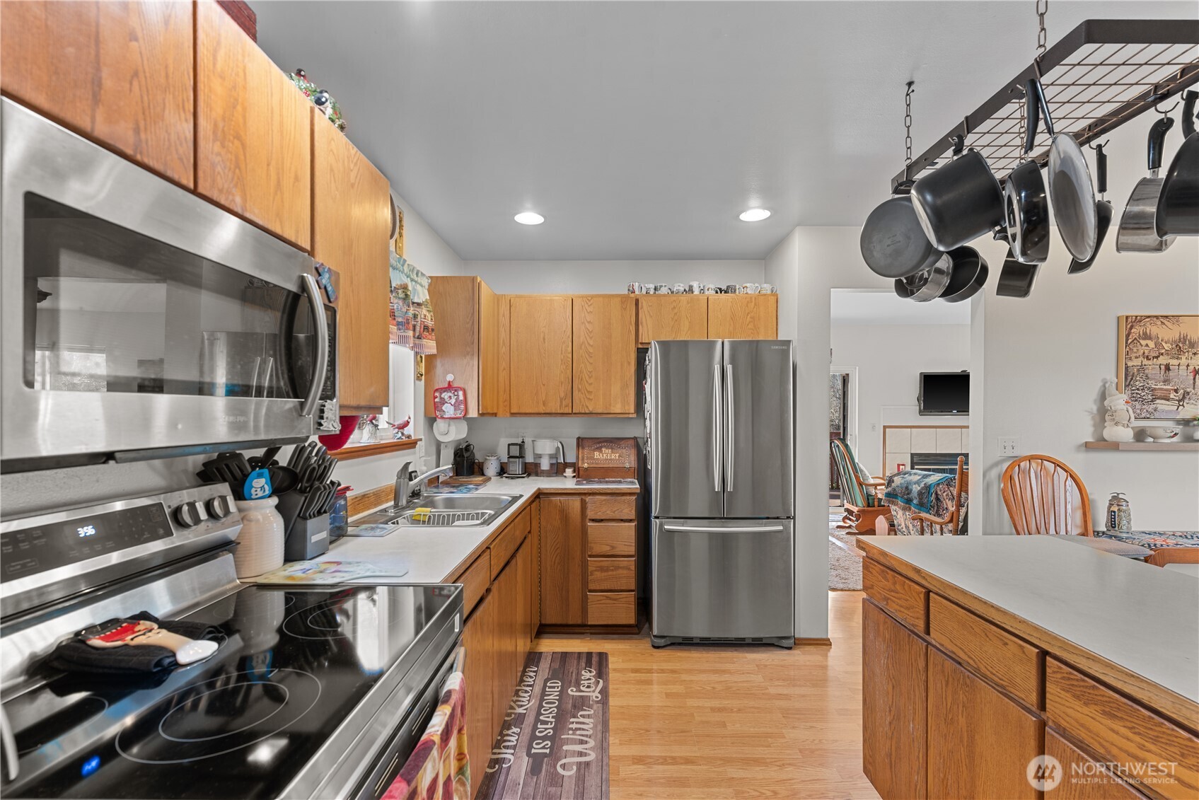 3152 Bermuda Street Malaga, WA 98828 - Photo 16 of 37 a kitchen with lots of counter space and stainless steel appliances