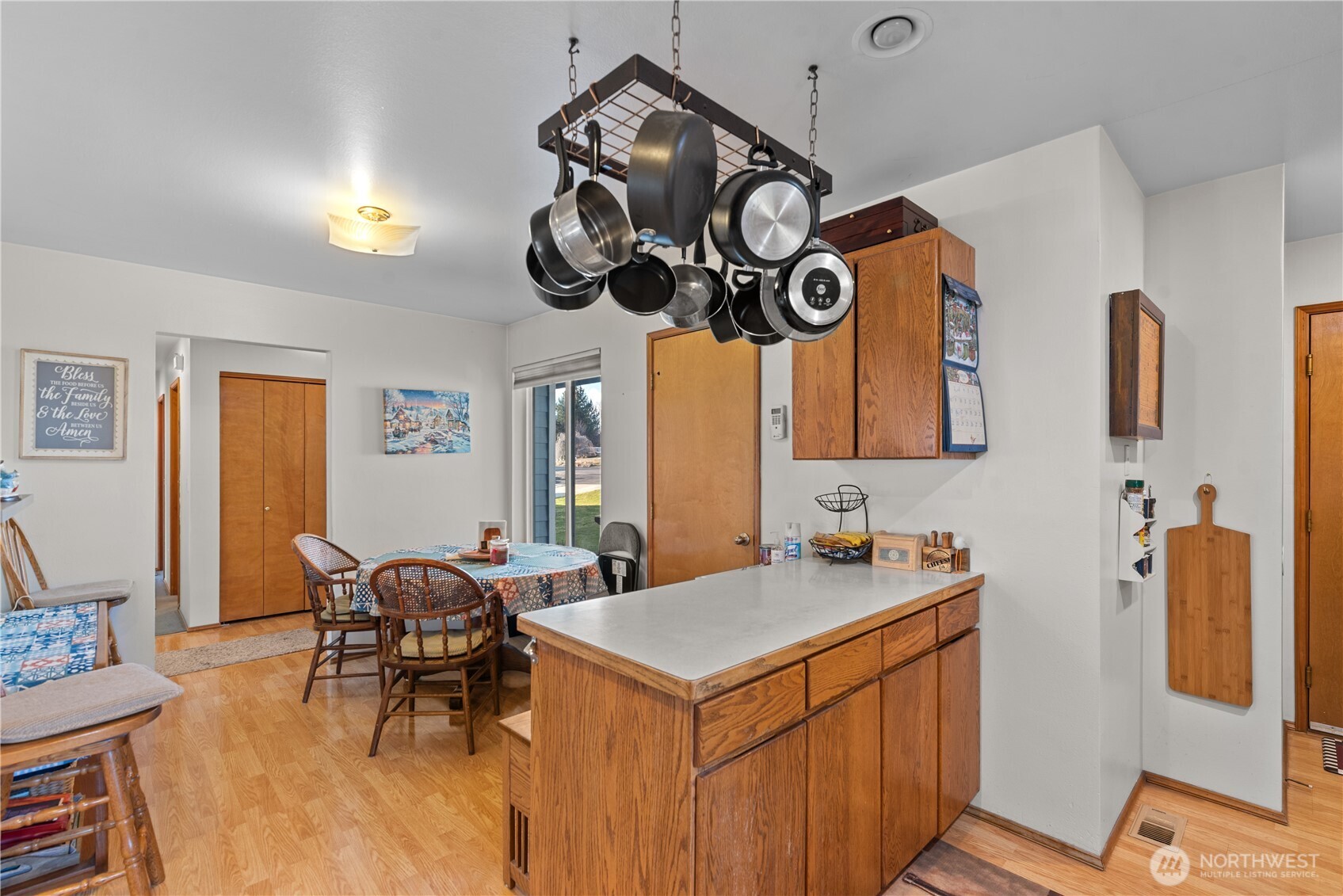 3152 Bermuda Street Malaga, WA 98828 - Photo 18 of 37 a view of a kitchen area with furniture and chandelier