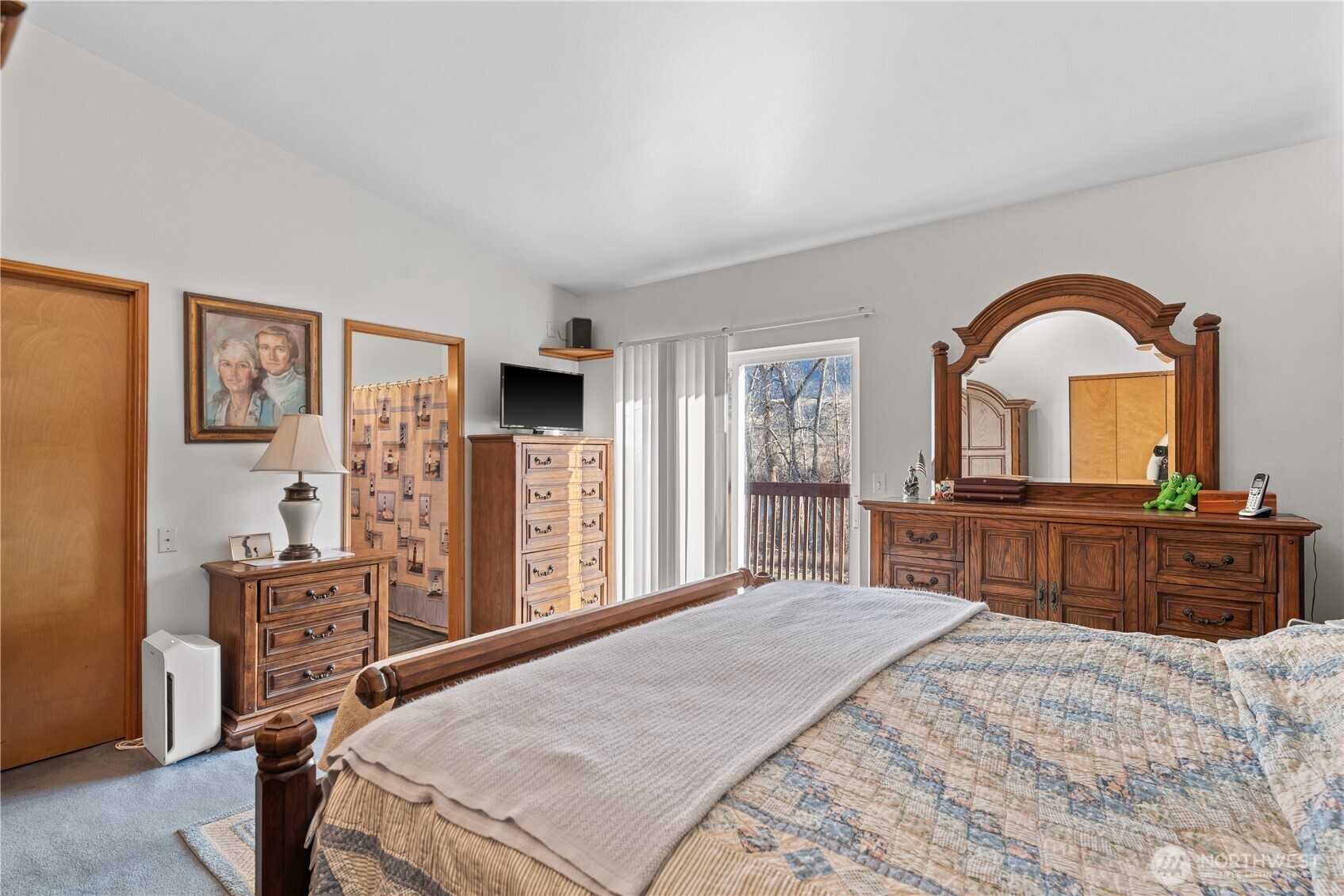 3152 Bermuda Street Malaga, WA 98828 - Photo 22 of 37 a bedroom with a bed and a large window