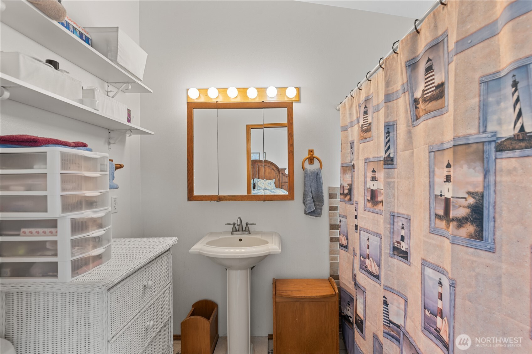 3152 Bermuda Street Malaga, WA 98828 - Photo 23 of 37 a bathroom with a sink toilet and shower