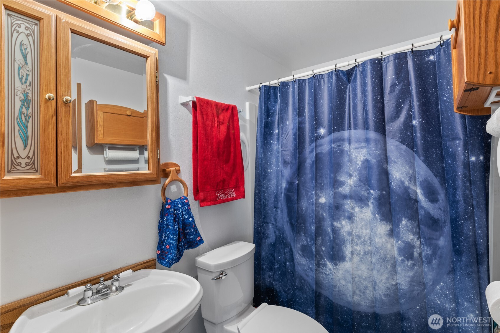 3152 Bermuda Street Malaga, WA 98828 - Photo 28 of 37 a bathroom with a toilet and a sink