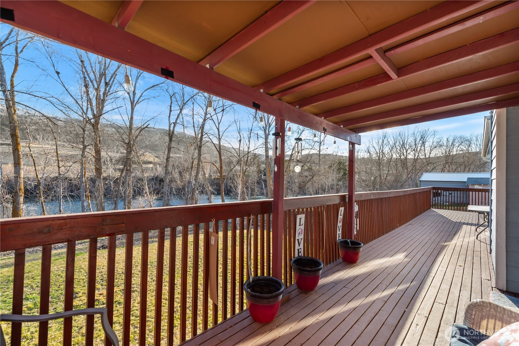 3152 Bermuda Street Malaga, WA 98828 - Photo 32 of 37 a view of balcony with wooden floor