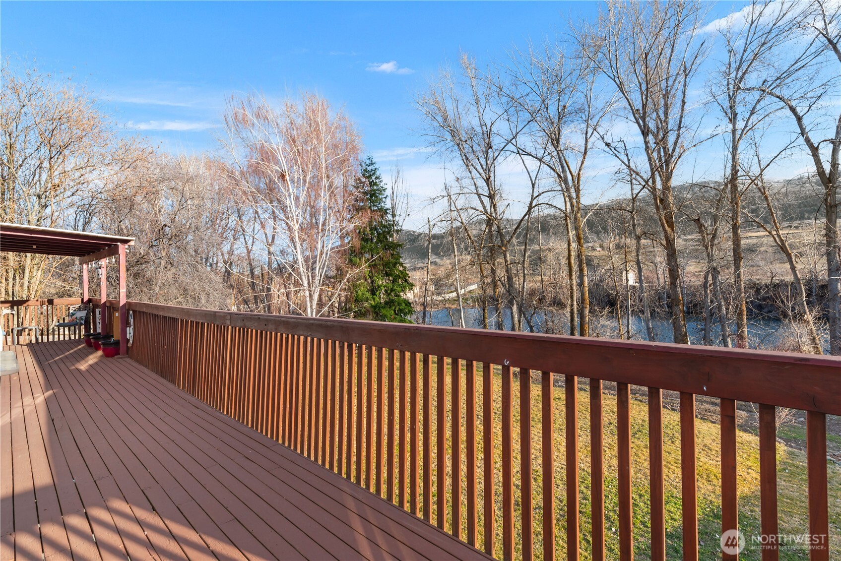 3152 Bermuda Street Malaga, WA 98828 - Photo 33 of 37 a view of balcony with wooden floor and fence