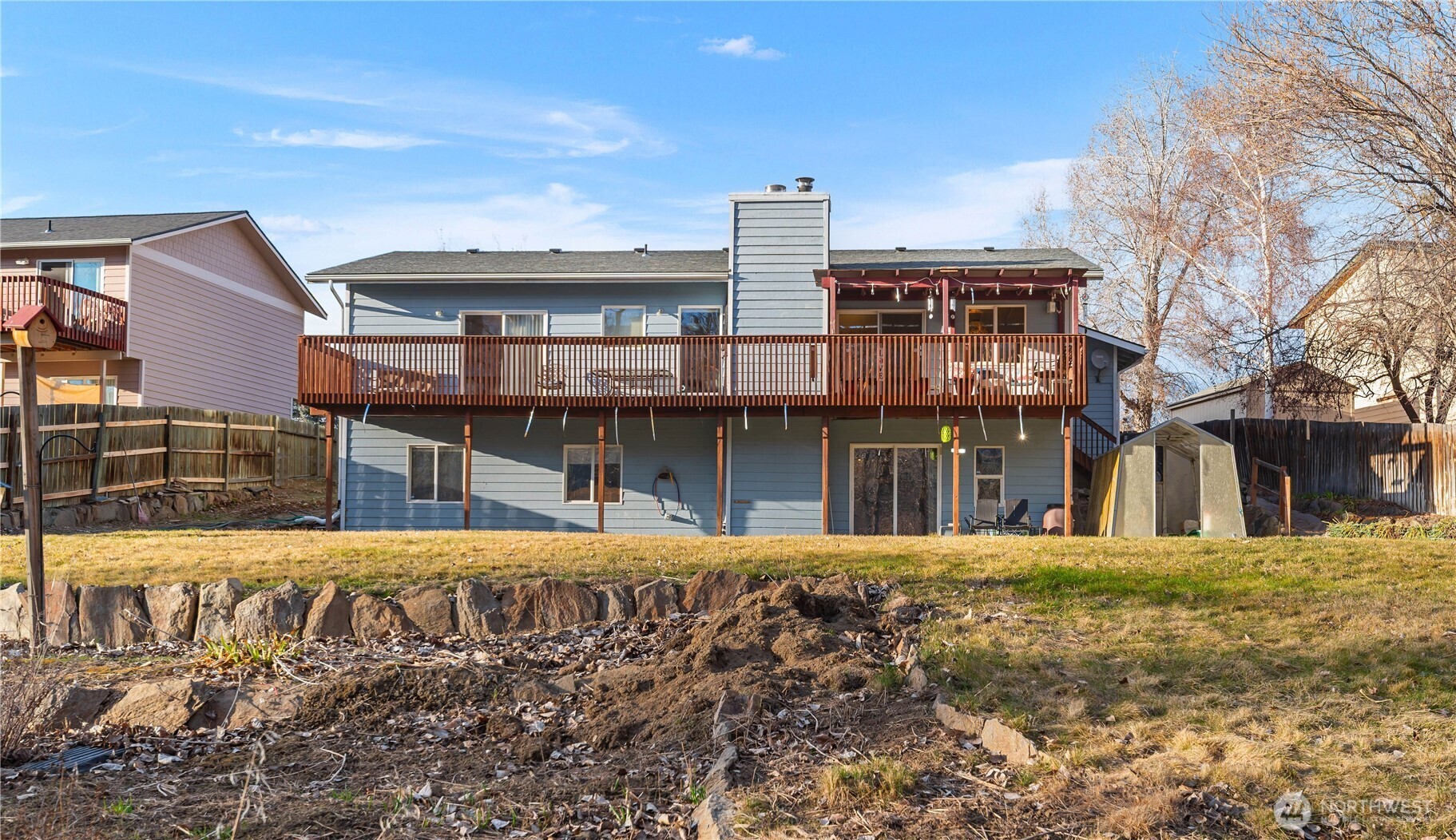3152 Bermuda Street Malaga, WA 98828 - Photo 35 of 37 a front view of a building with a garden