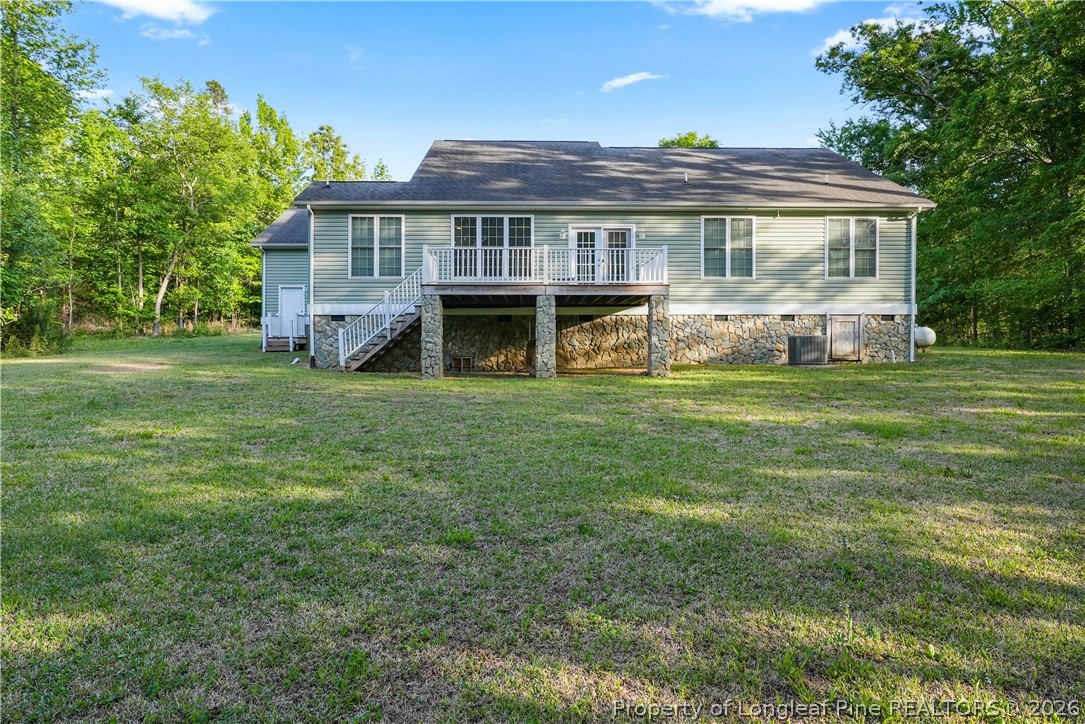 280 Hemp St Extension Robbins, NC 27325 - Photo 28 of 29 a view of a house with a big yard and large trees
