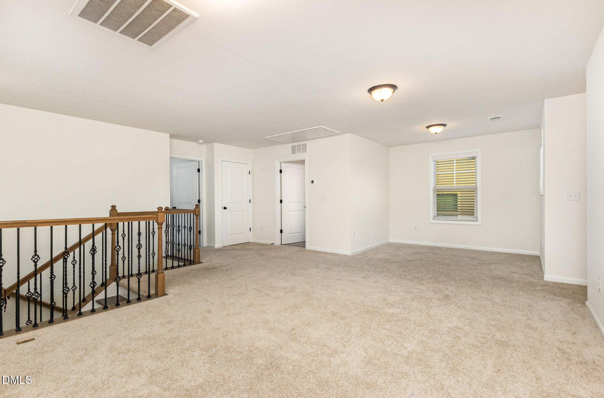824 Country Downs Road Wake Forest, NC 27587 - Photo 17 of 43 a view of an empty room with a window