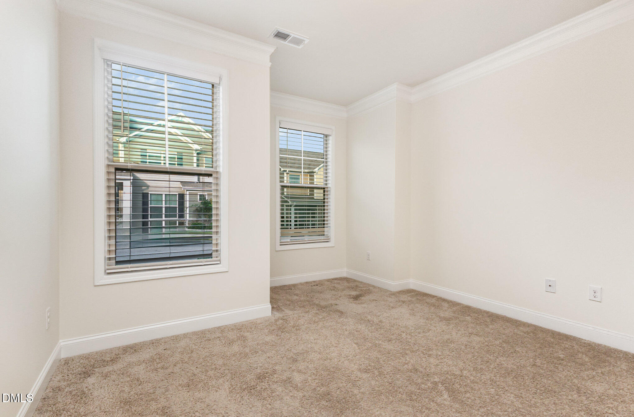 824 Country Downs Road Wake Forest, NC 27587 - Photo 21 of 43 an empty room with a window