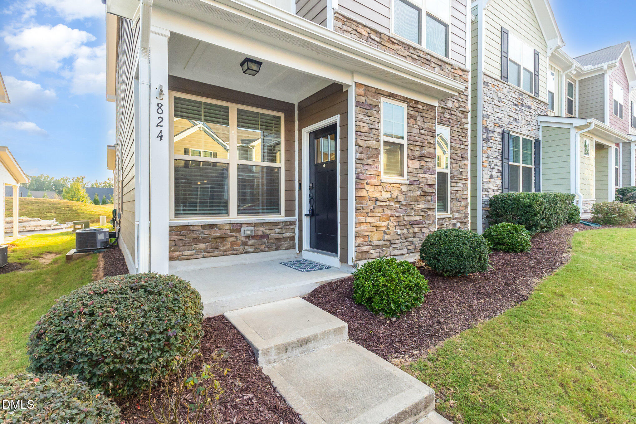 824 Country Downs Road Wake Forest, NC 27587 - Photo 6 of 43 a view of a garden with a potted plant