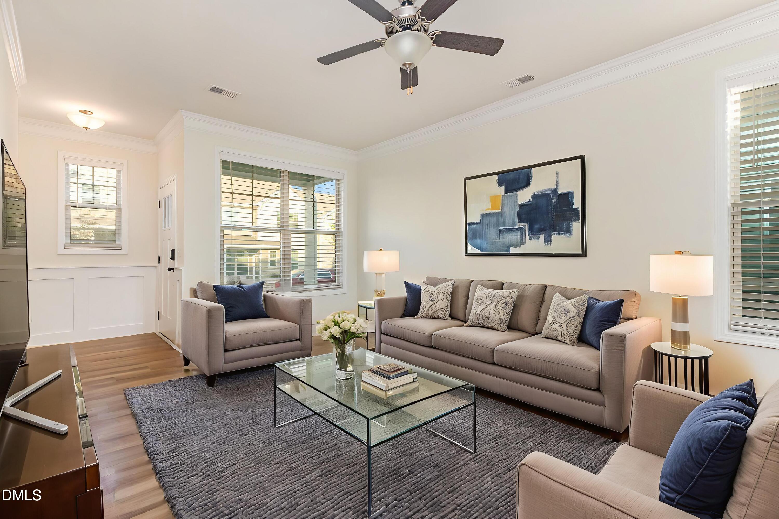 824 Country Downs Road Wake Forest, NC 27587 - Photo 8 of 43 a living room with furniture and a window