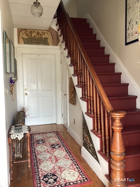 21 High Street, Unit B Clinton, CT 06413 - Photo 15 of 22 Front stairway up to apartment