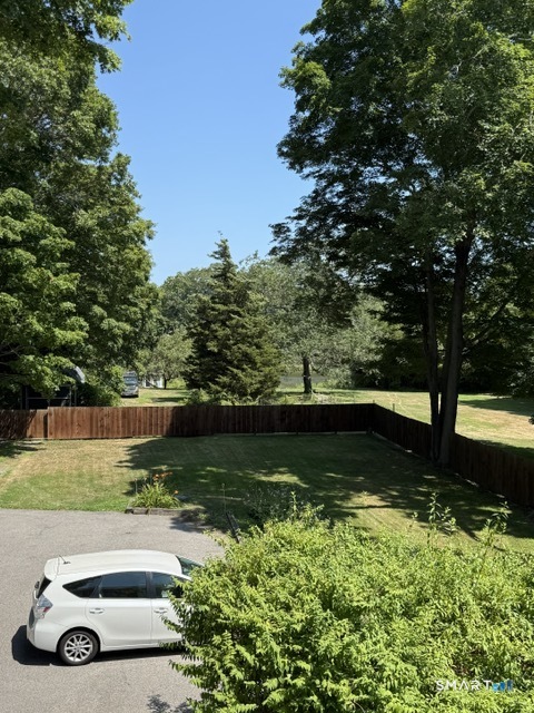 21 High Street, Unit B Clinton, CT 06413 - Photo 20 of 22 parking lot and long distant view of the Indian River