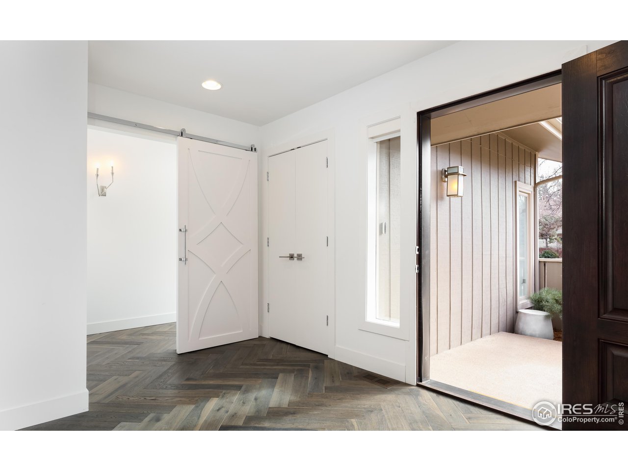 5315 Centennial Trail Boulder, CO 80303 - Photo 23 of 40 Exquisite barn door entry to the hidden, dreamy, luxurious primary suite