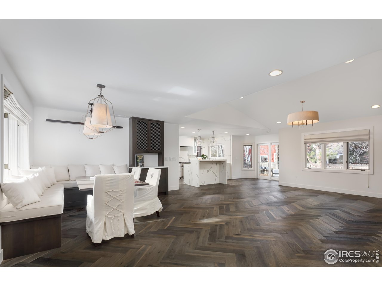 5315 Centennial Trail Boulder, CO 80303 - Photo 40 of 40 Great room. Open floor plan. Banquette dining area. Add'l dining alcove near kitchen. Herringbone hardwoods throughout.