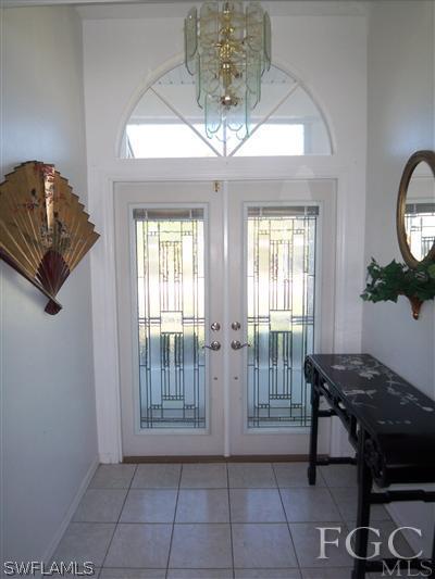 9024 Frank Road Fort Myers, FL 33967 - Photo 8 of 10 a living room with furniture and a window