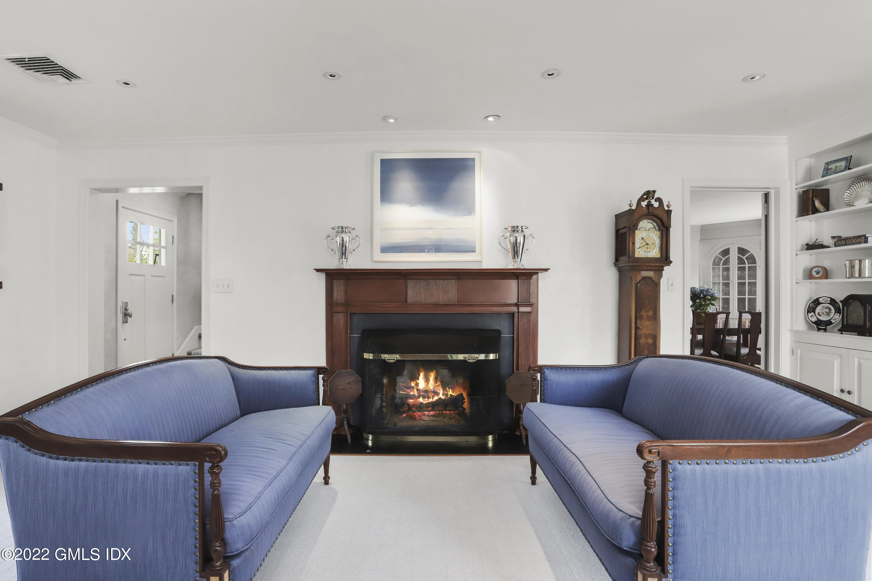 65 Doubling Road Greenwich, CT 06830 - Photo 3 of 33 a living room with furniture and a fireplace