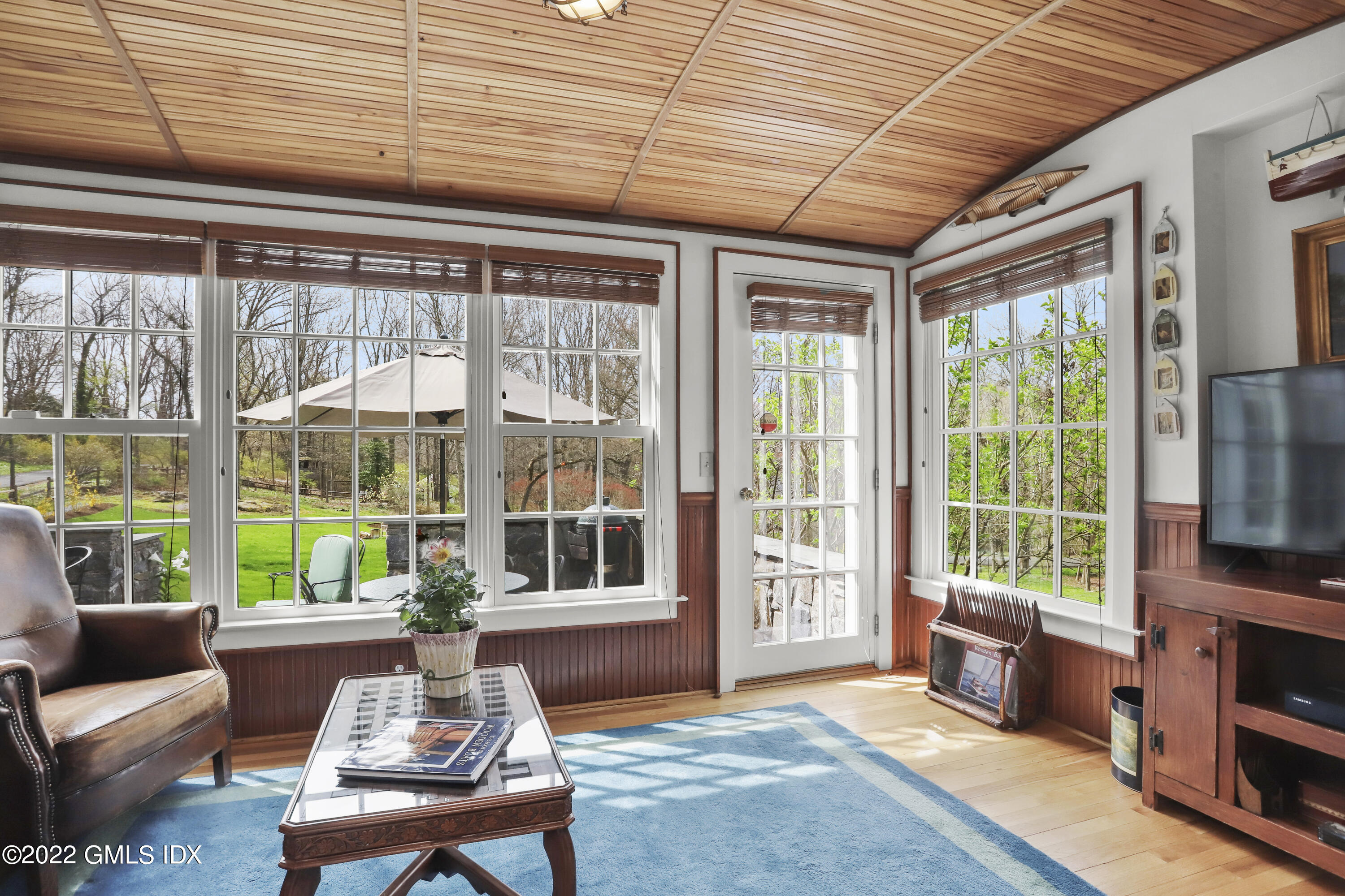65 Doubling Road Greenwich, CT 06830 - Photo 7 of 33 a living room with furniture tv and a window