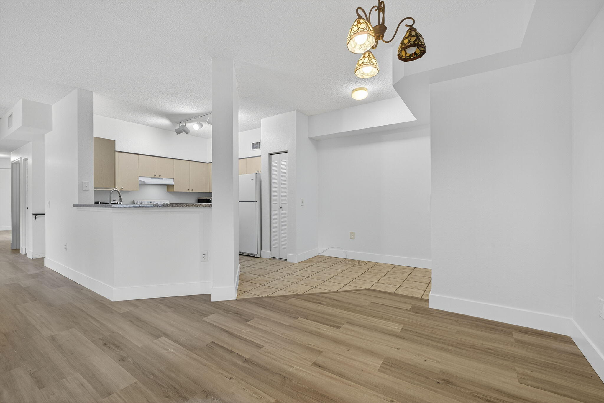 340 Crestwood Circle, Unit 201 Royal Palm Beach, FL 33411 - Photo 18 of 41 a view of a kitchen cabinets a sink and dishwasher