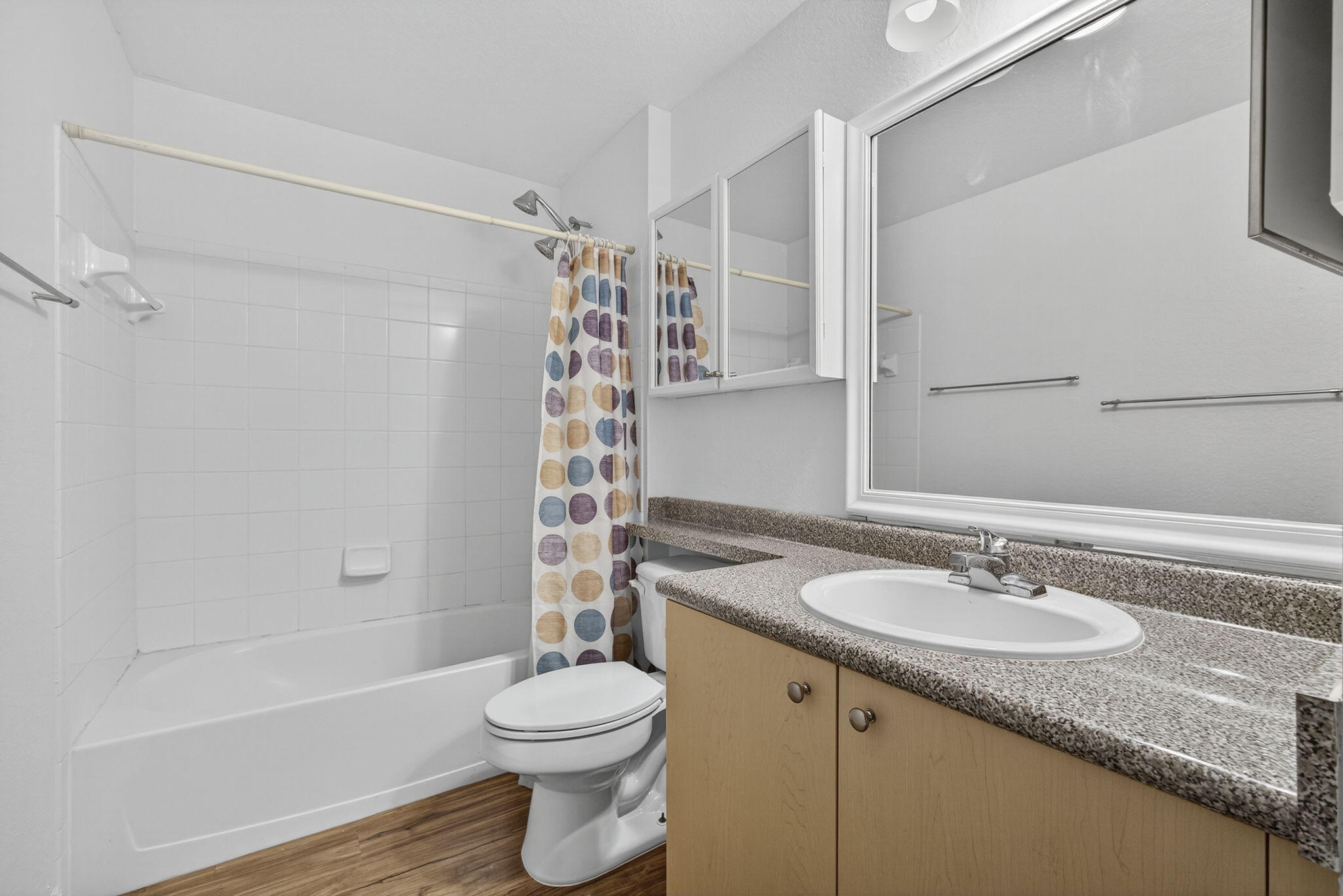 340 Crestwood Circle, Unit 201 Royal Palm Beach, FL 33411 - Photo 30 of 41 a bathroom with a granite countertop sink toilet and shower