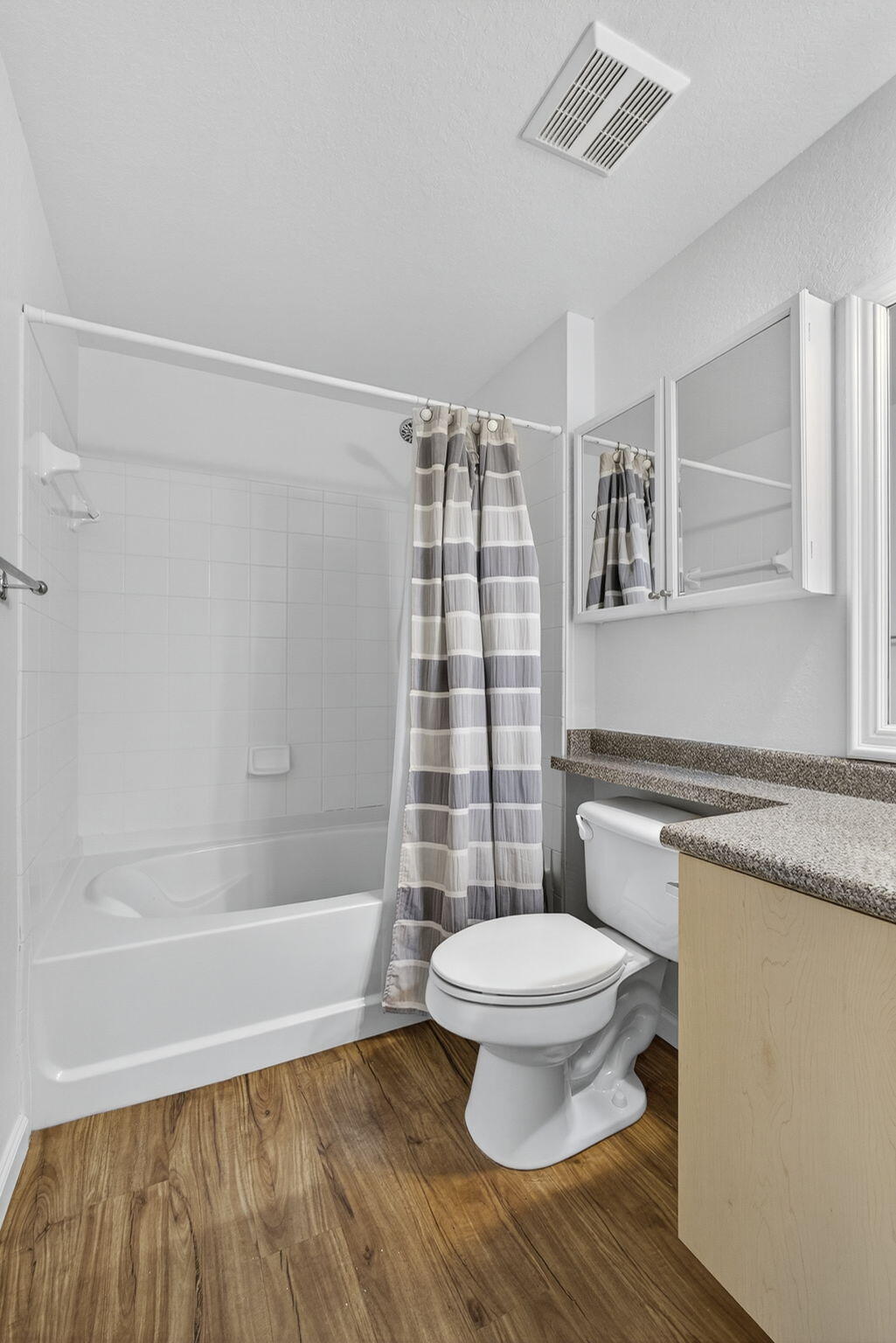 340 Crestwood Circle, Unit 201 Royal Palm Beach, FL 33411 - Photo 36 of 41 a bathroom with a toilet and a shower