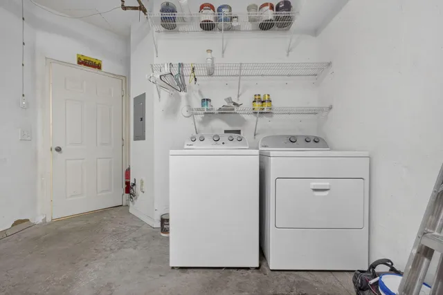 a view of a park with large trees