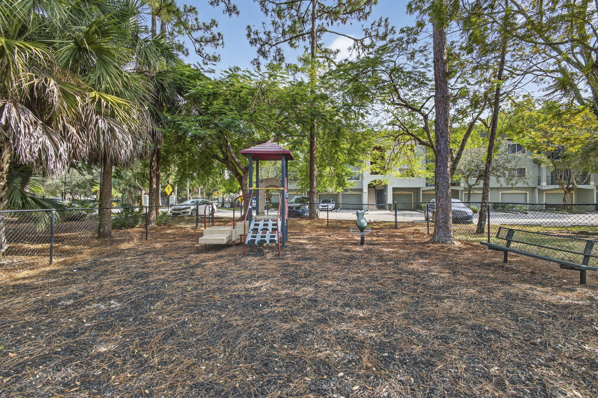 340 Crestwood Circle, Unit 201 Royal Palm Beach, FL 33411 - Photo 38 of 41 a view of a park with large trees