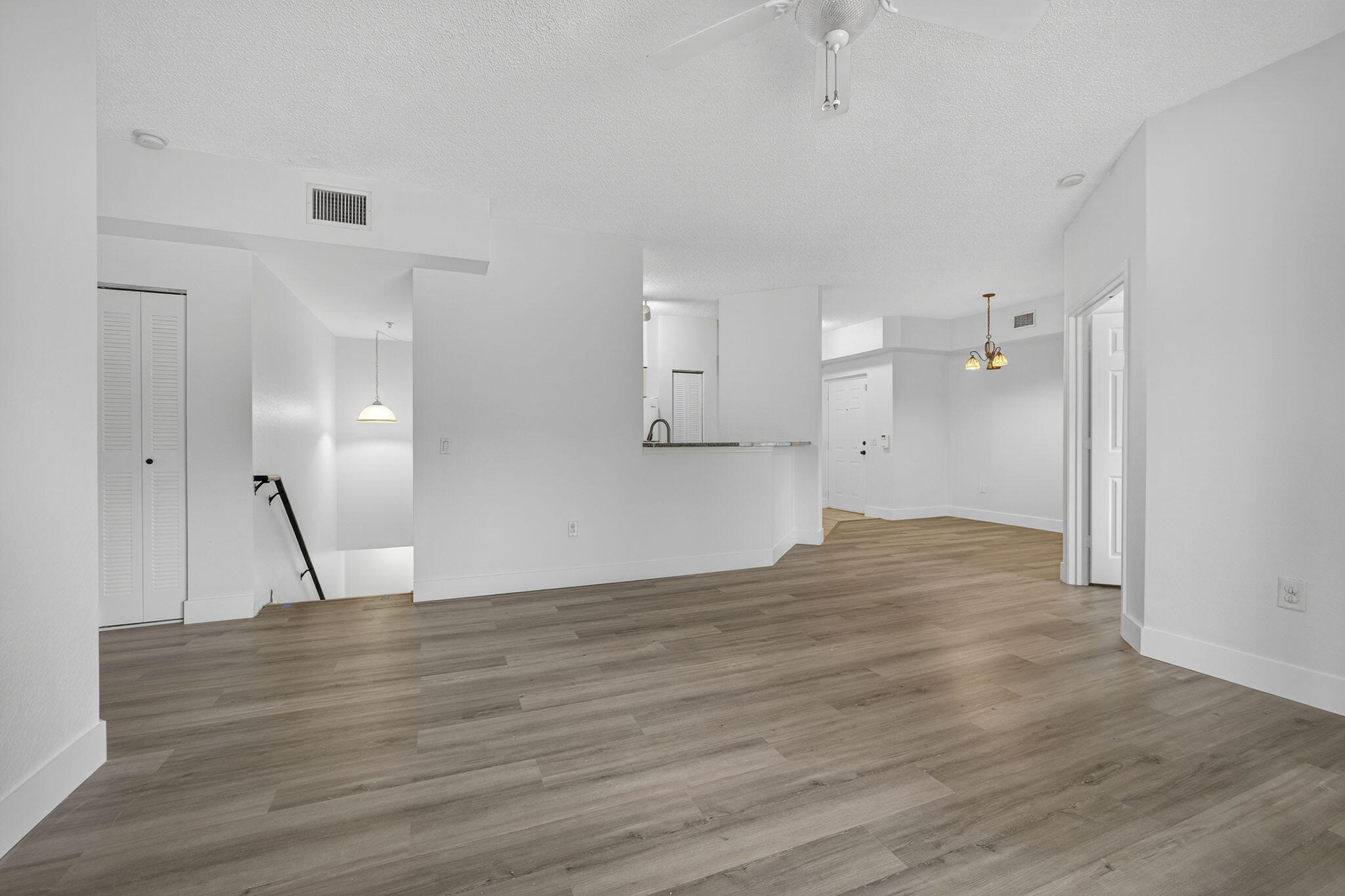 340 Crestwood Circle, Unit 201 Royal Palm Beach, FL 33411 - Photo 10 of 41 a view of empty room with wooden floor