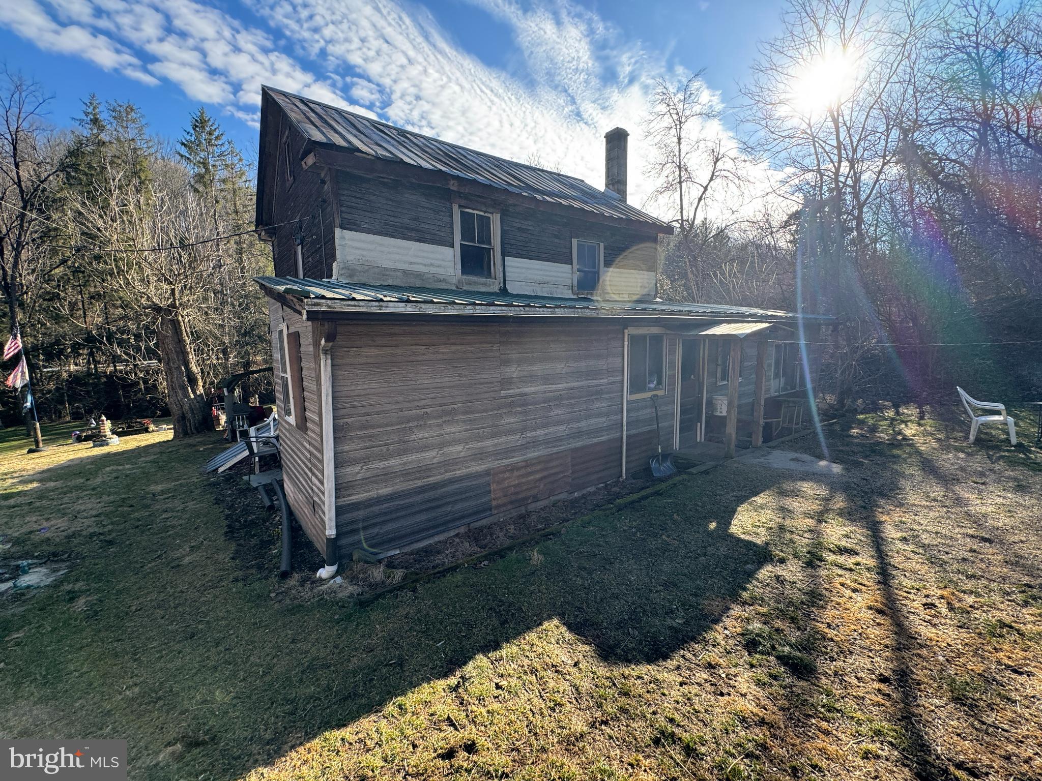 212 Benton Road East Freedom, PA 16637 - Photo 8 of 8 a view of a backyard of the house