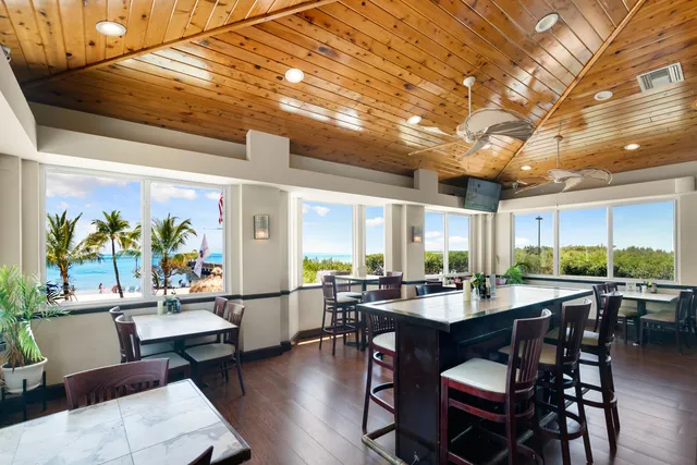 a view of a chairs and table in a patio