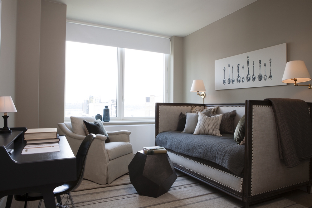 550 West 45th Street, Unit 2513 Manhattan, NY 10036 - Photo 6 of 22 a living room with furniture and a window