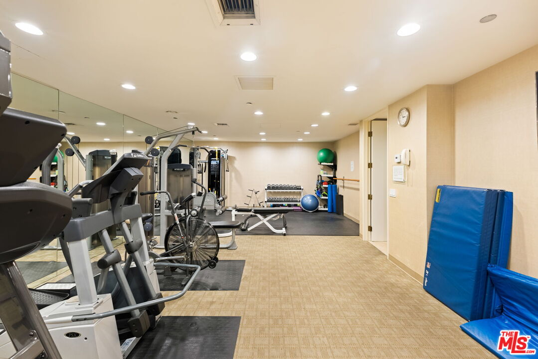 300 North Swall Drive, Unit 353 Beverly Hills, CA 90211 - Photo 31 of 31 a view of a room with gym equipment